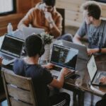 How We Scaled from Freelancer to 16-Person Team: Lessons from Building a Vietnamese WordPress Agency 2 WordPress agency team meeting in Hanoi Vietnam