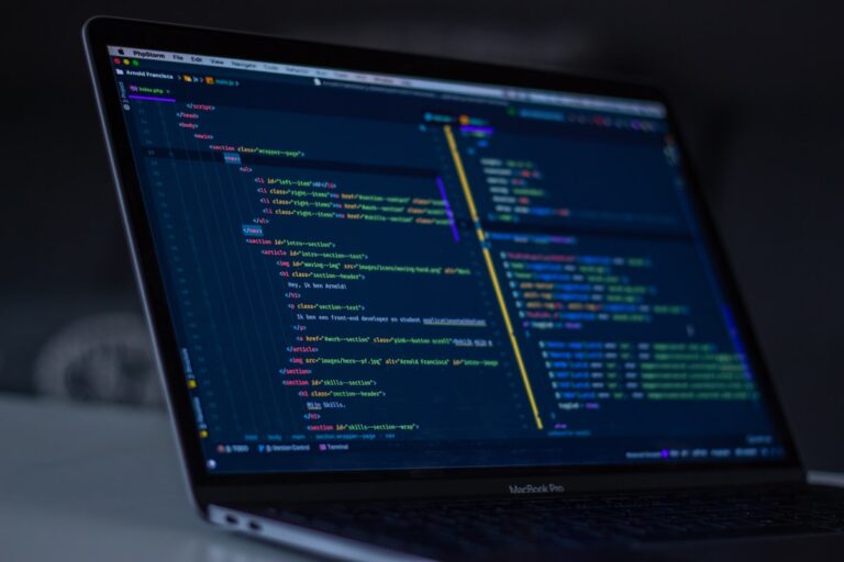Developer working on code migration project, modern web development workspace with code editor